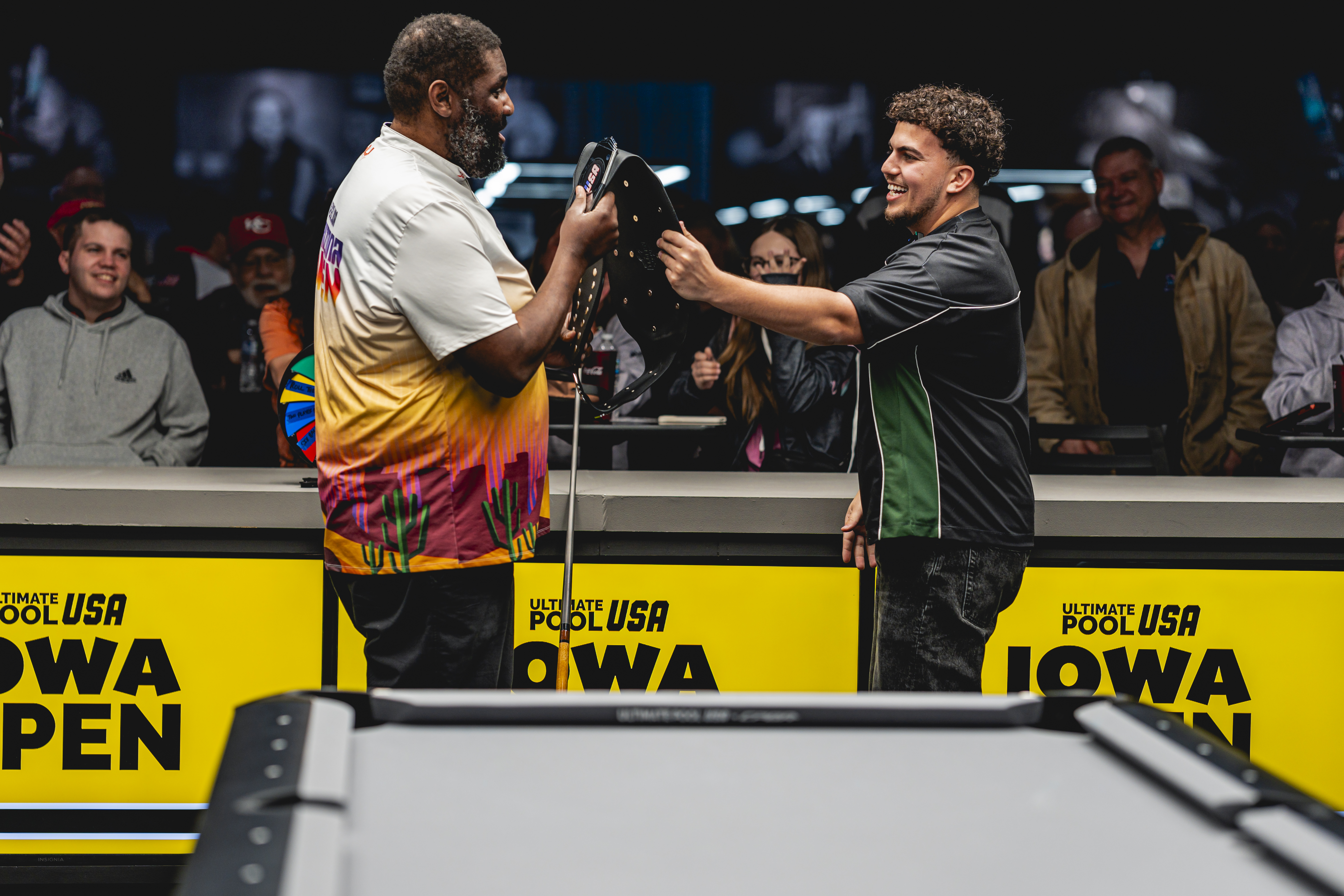 Ayd presenting the championship belt