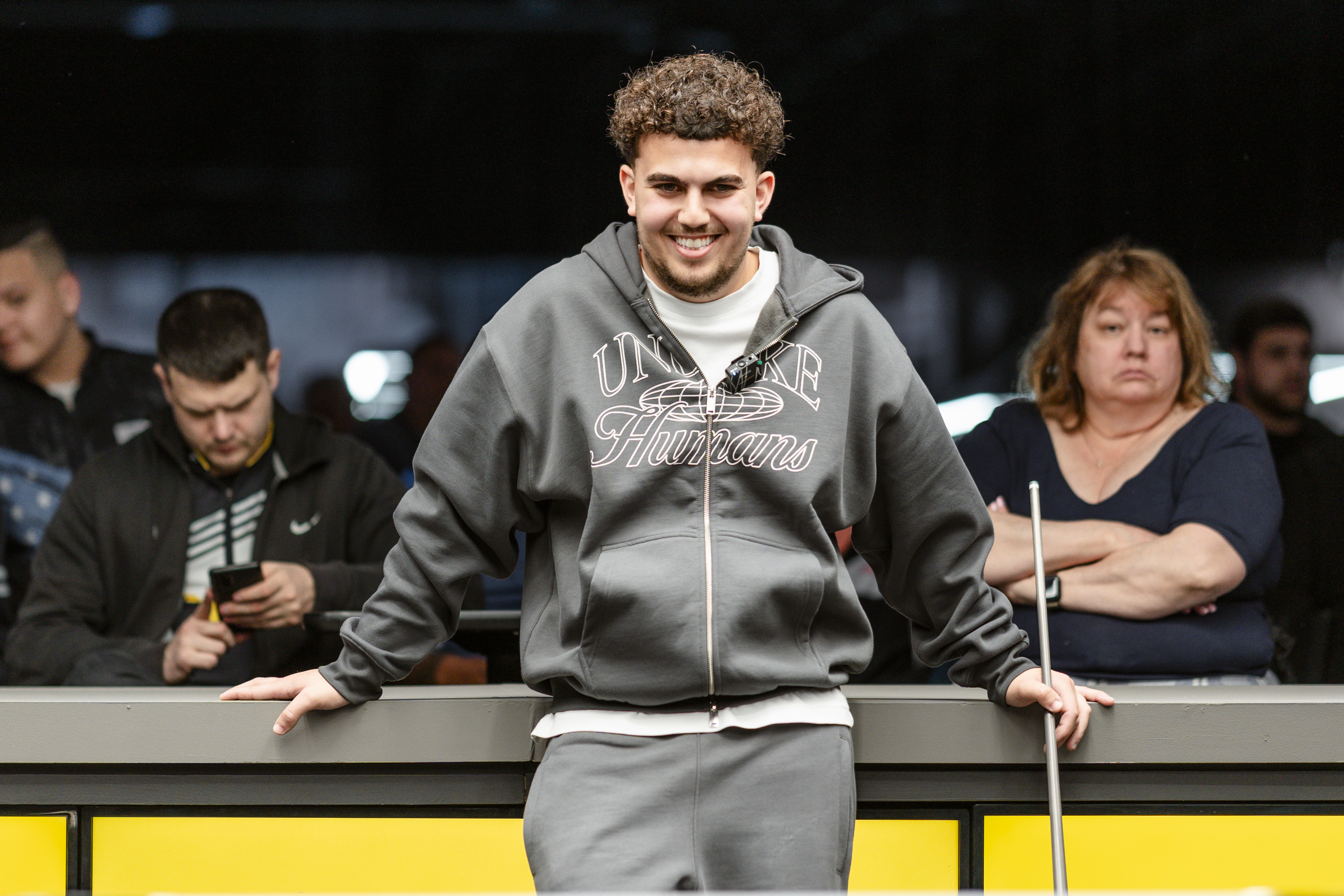 Ayd smiling with the crowd behind