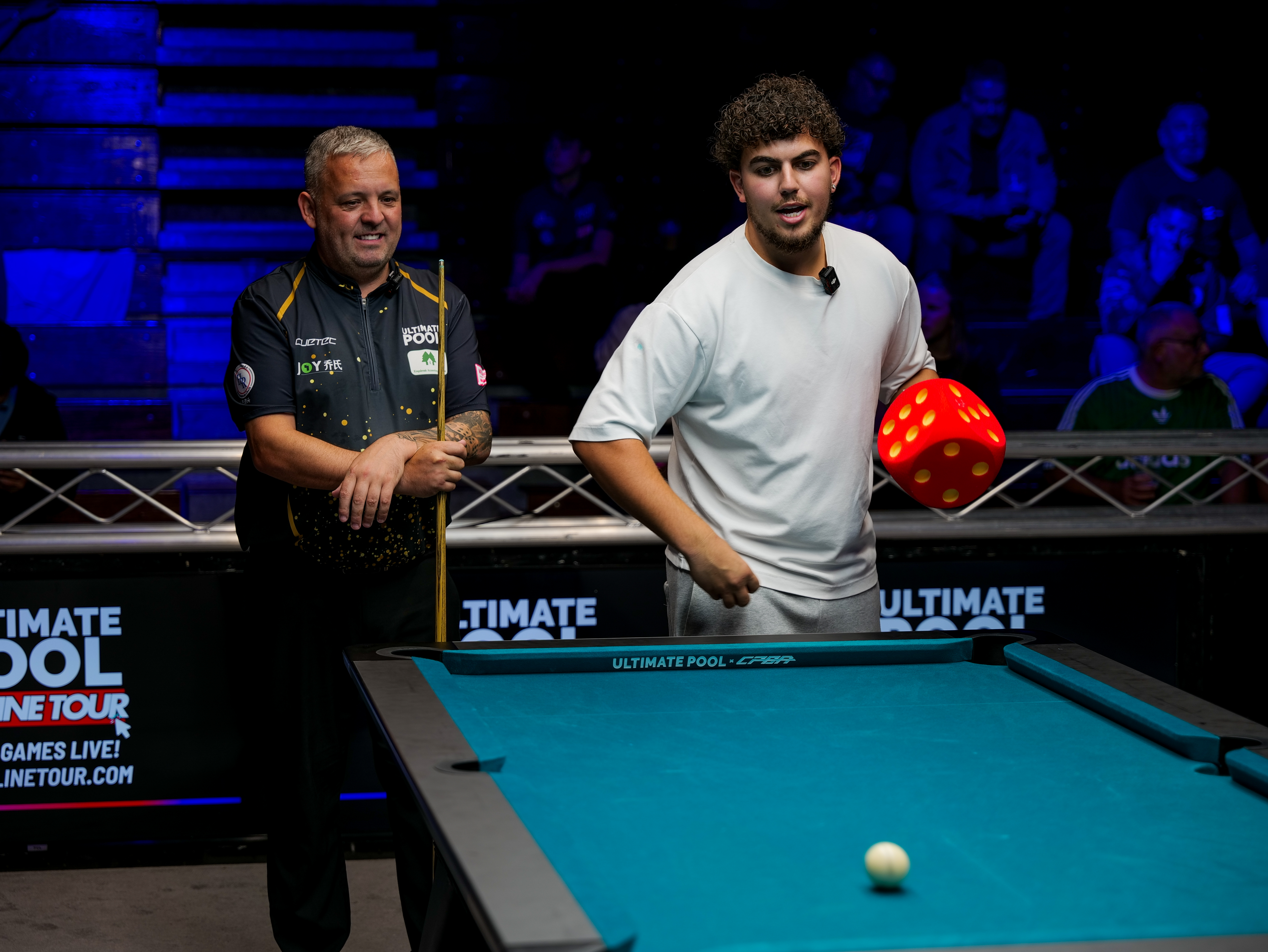 Ayd throwing the big dice at a pool event