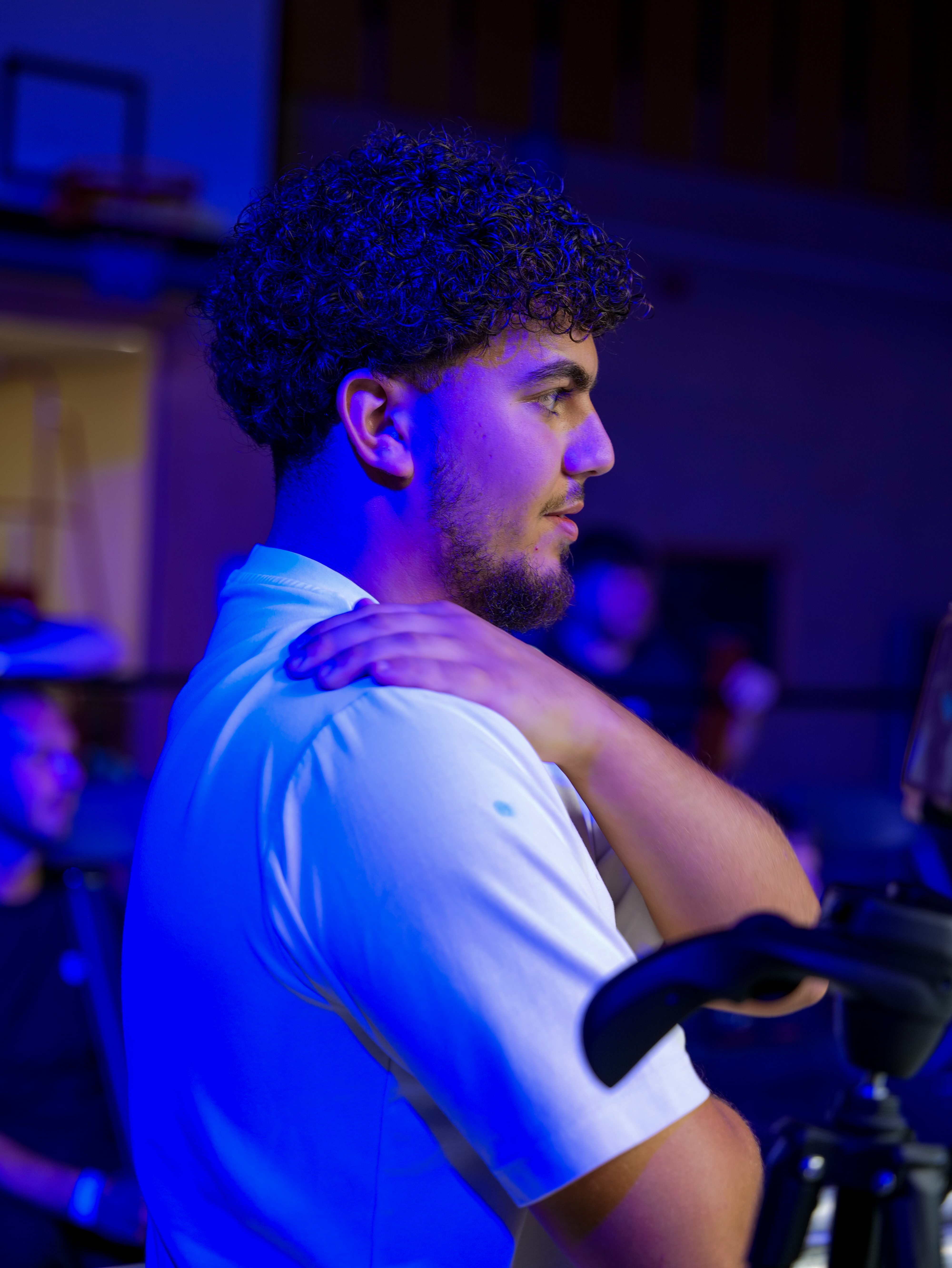 Ayd in dramatic blue lighting